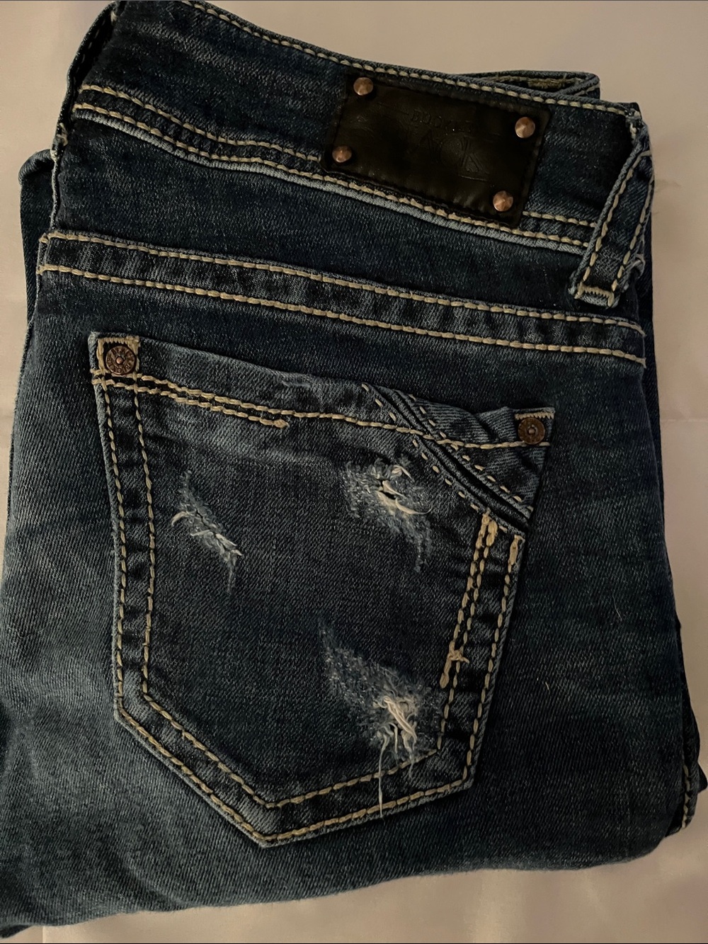 Buckle Women's Indigo Distressed Boot Cut Jeans